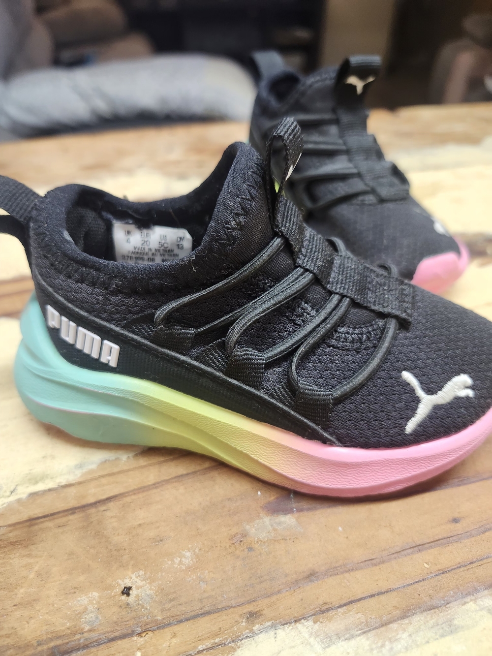 Puma Kids Black Slip-On Sneakers with Rainbow Gradient Midsole